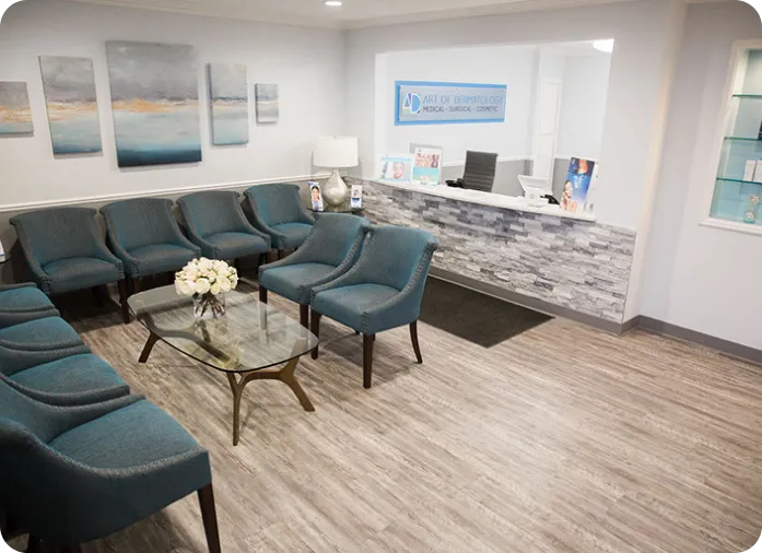 Modern and welcoming dermatology clinic waiting area with comfortable seating and stylish decor for patient comfort.