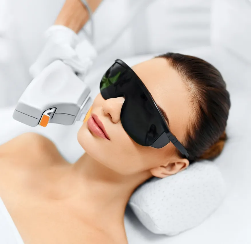 Laser skin treatment at a dermatology clinic for facial rejuvenation, reducing pigmentation, and improving skin texture.