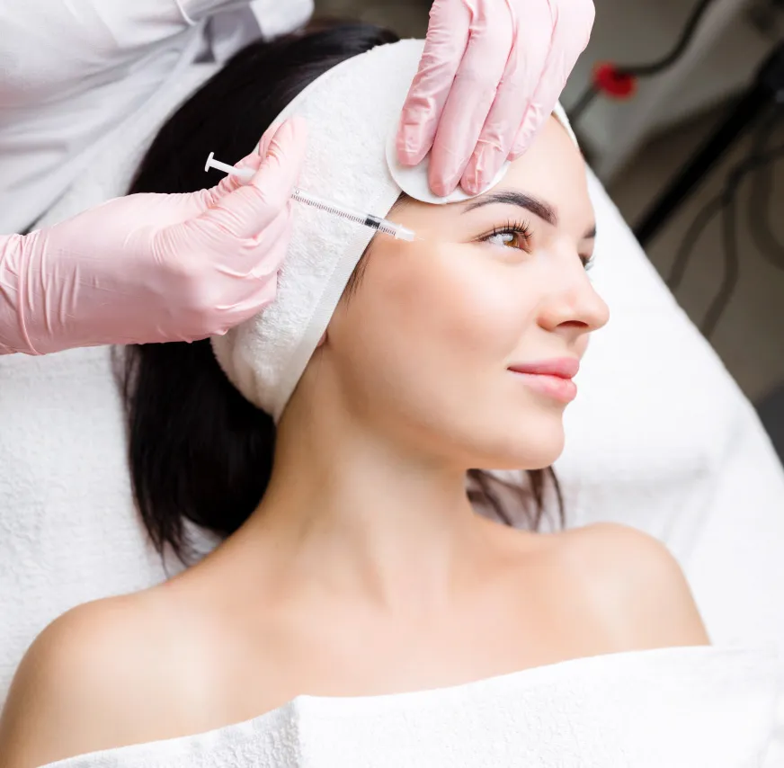 Cosmetic Botox injection at a dermatology clinic to reduce fine lines and wrinkles for a youthful, rejuvenated appearance.