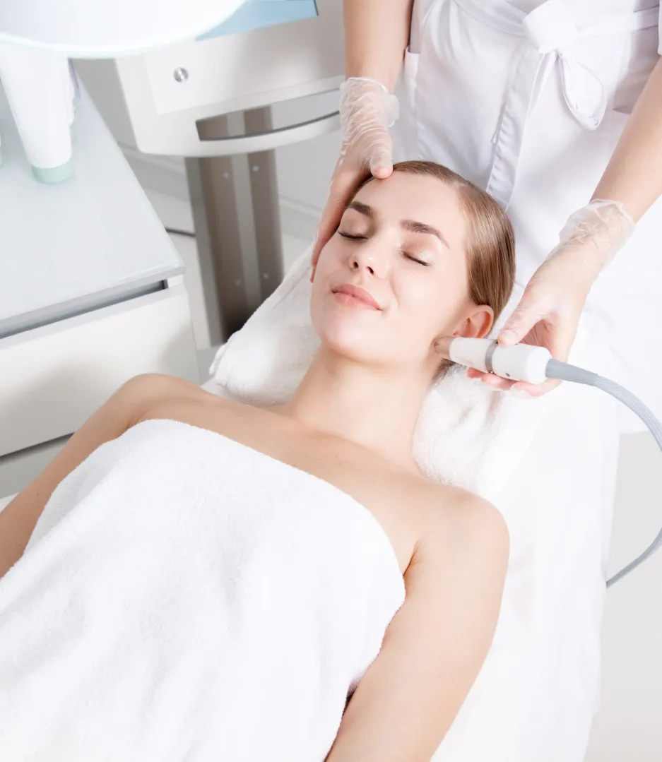 Dermatologist performing laser hair removal treatment for smooth, hair-free skin.