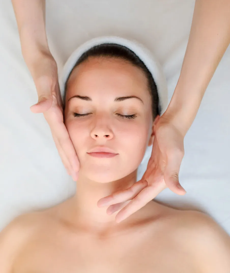 Relaxing facial massage for glowing skin at a professional dermatology and skincare clinic.